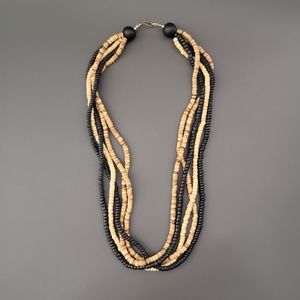 Multi strand wood torsade necklace